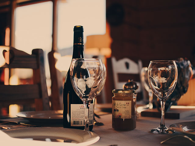 Closeup of dinner table with wine